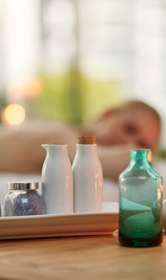 A Vase Sitting On Top Of A Wooden Table